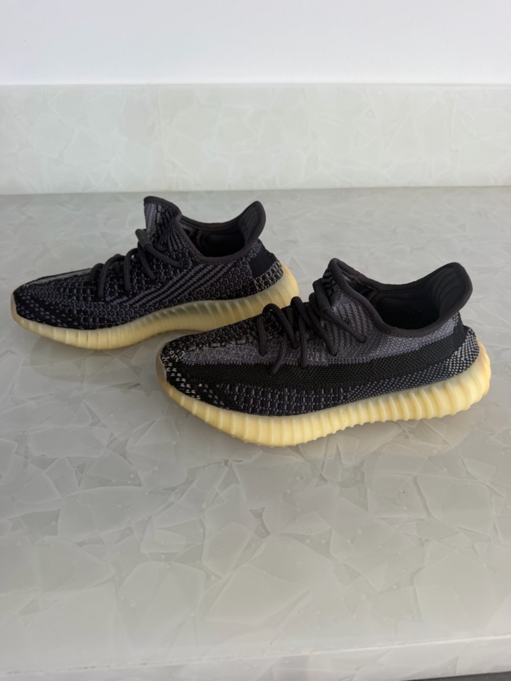 Yeezy Black Knit Sneaker with Pale Yellow Ribbed Midsole